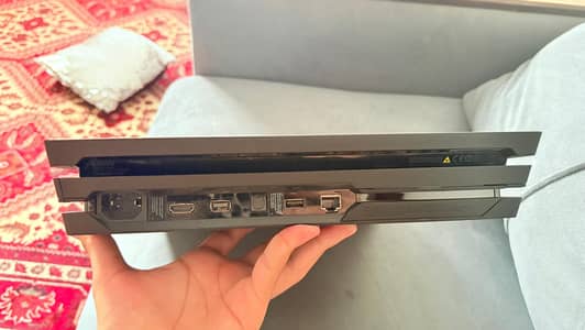 PS4 Pro 1TB Jailbroken + 2 Controllers – Excellent Condition