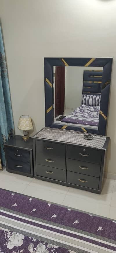 Bed with side tables and dressing