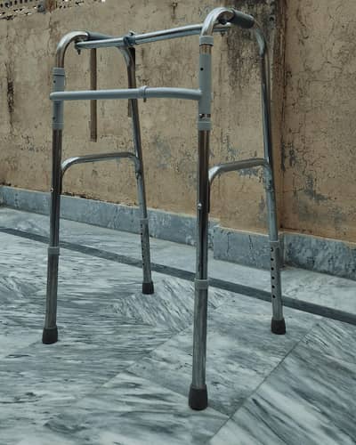 Foldable walker for sale - Barely Used - Adjustable Height