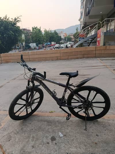 26 size bicycle with 3x7 gears alloy rims, dual disk brakes