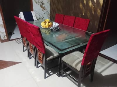 wooden dining table set available for sale.