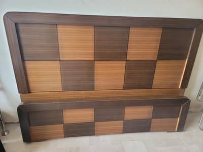 Semi double bed with quilted spring mattress