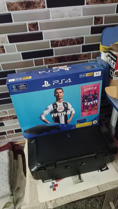 PS4 SLIM 1TB WITH 2 CONTROLLERS + GAMES INCLUDED