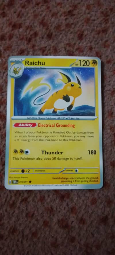 real pokemon tcg card of raichu