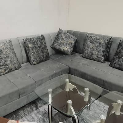 Grey L-Shaped Sofa Set with Cushions”