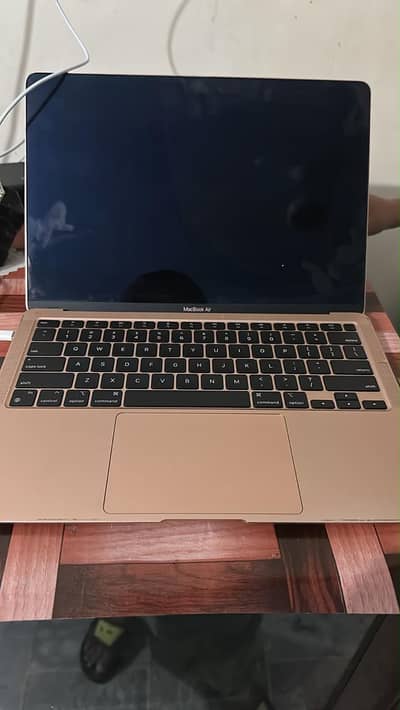 MacBook Air M1 (A2337) available for sale in damaged/locked condition.