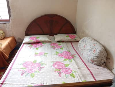old wooden bed