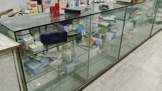 pharmacy glass counter and shelves