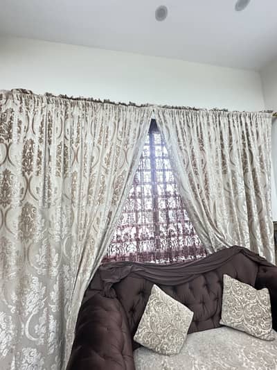 7 seater sofa along with curtains