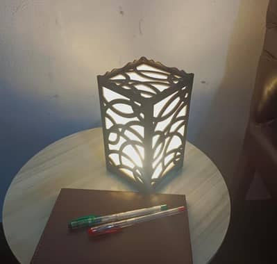modern wooden lamp with golden glow