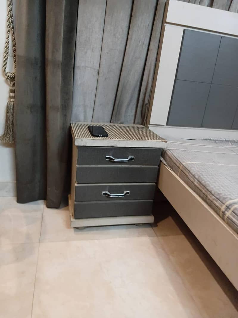 single bed with side table 3