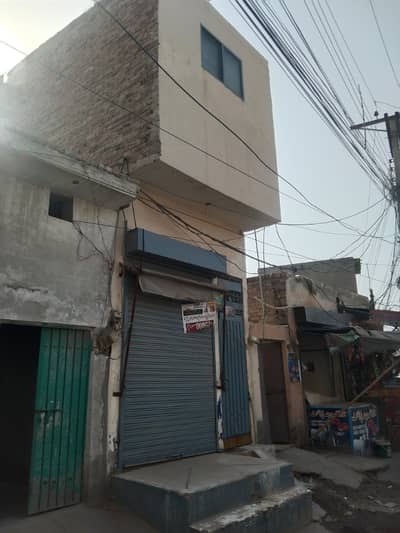 Aik mrla shop uper house sevra chok for sale