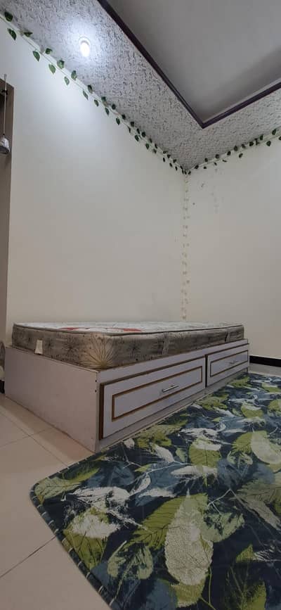 Single bed with spring mattress for sale
