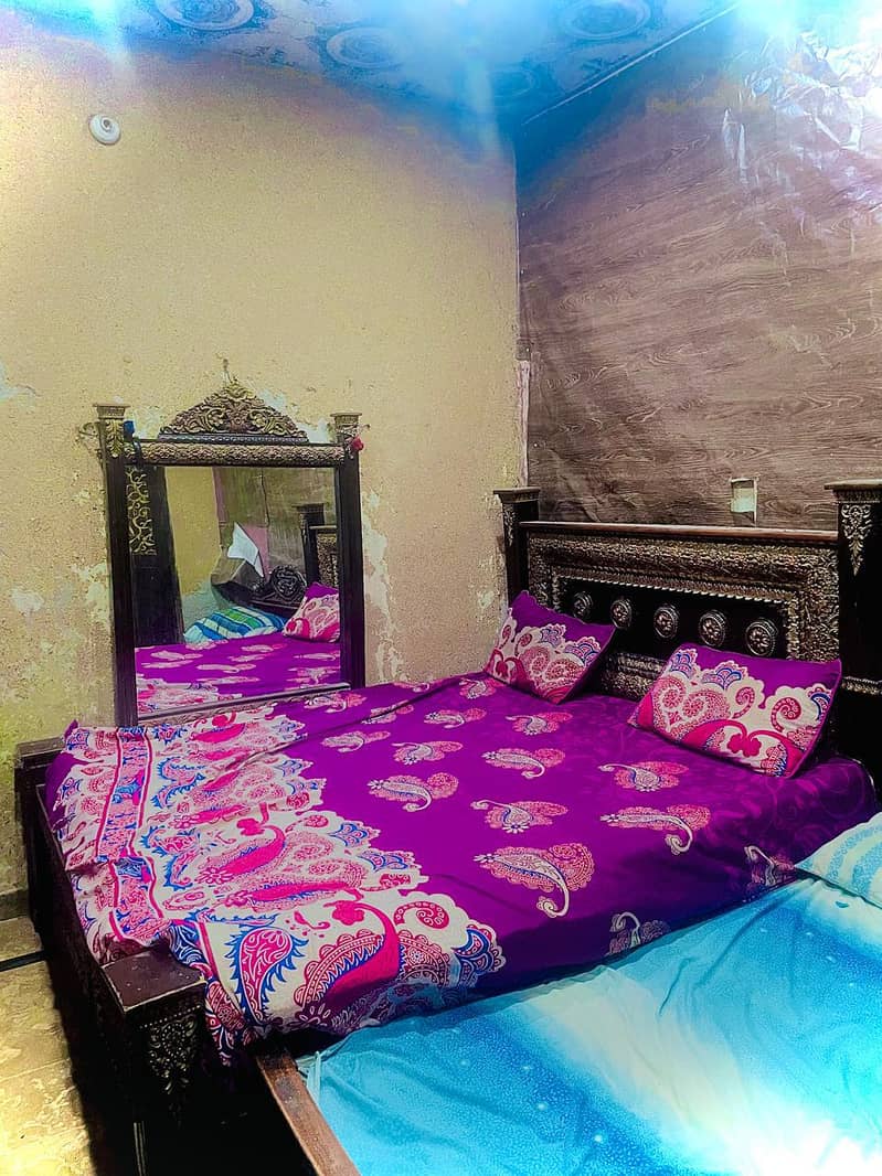 bed with drasing with side table 0
