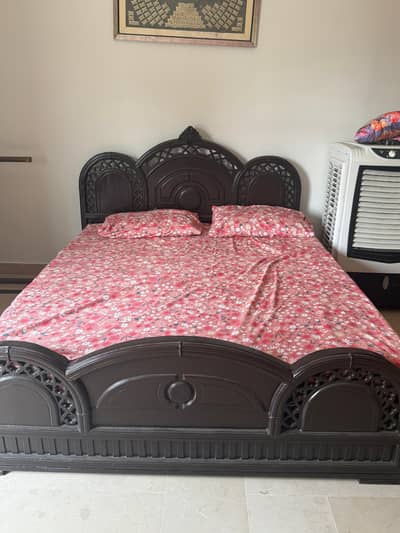 Queen size wooden bed