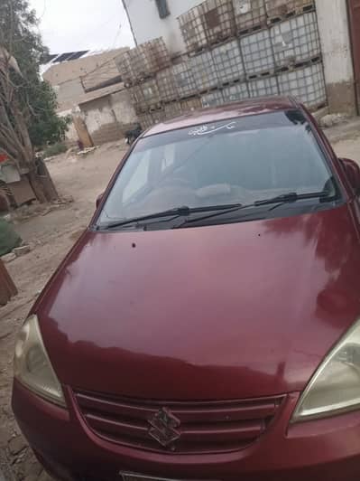 Suzuki Liana 2007 Model – Red Color – All Tax Paid Dec 2026