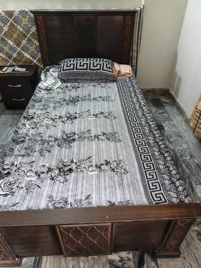 2 single beds with mattresses