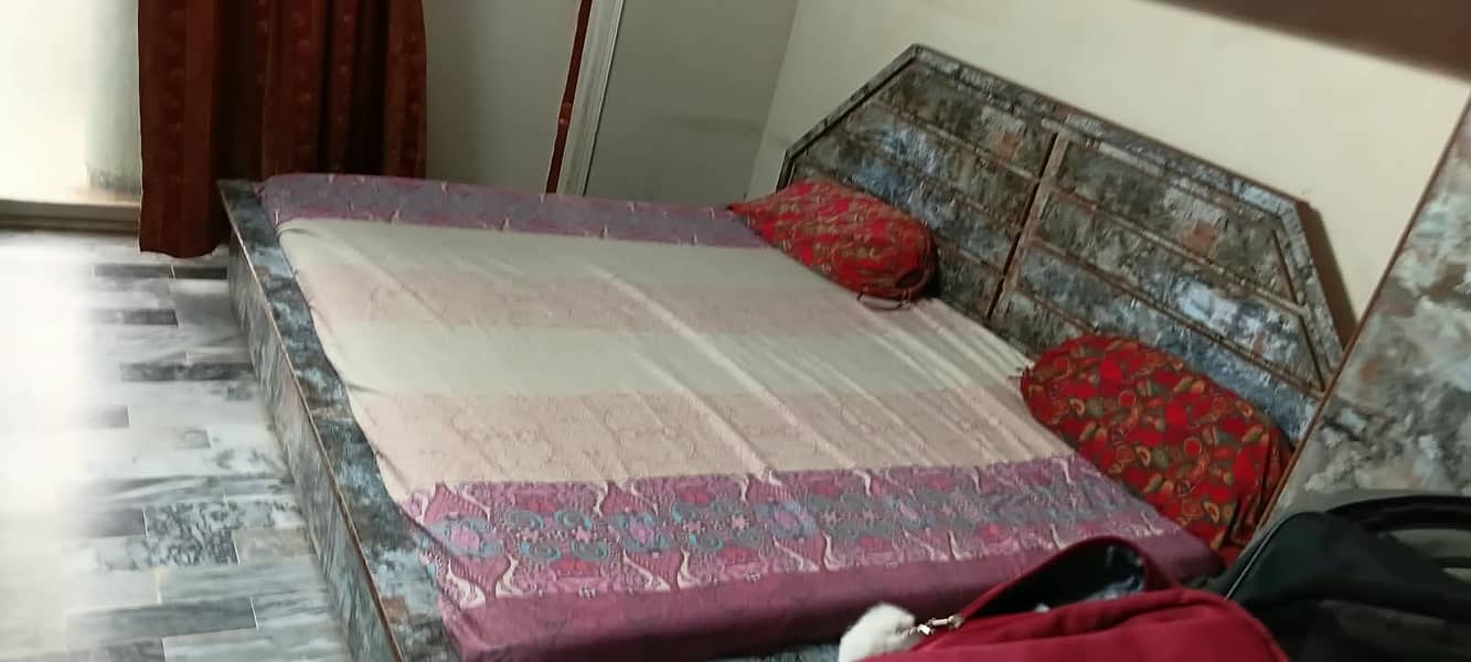 A very string Double bed with side tables 0
