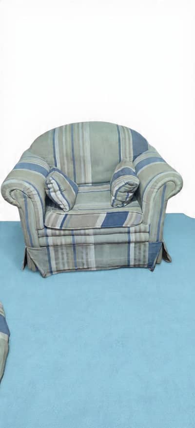 Two single seater sofas