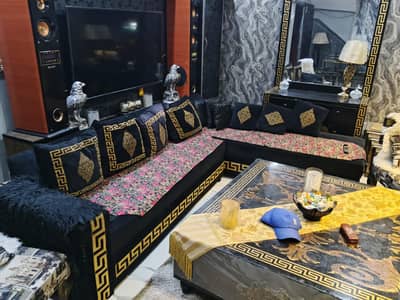 black Versace L shaped sofa for sale