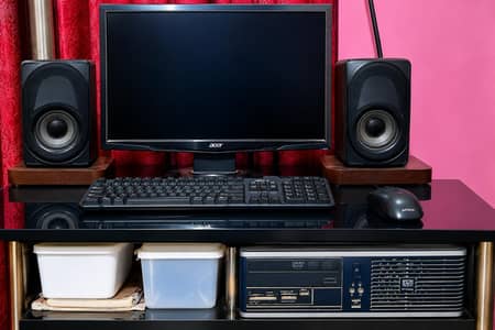 Hp CPU , Acer LCD, mouse, keyboard with two speakers and trolley