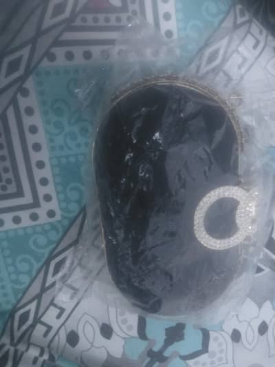 new black diamond clutch