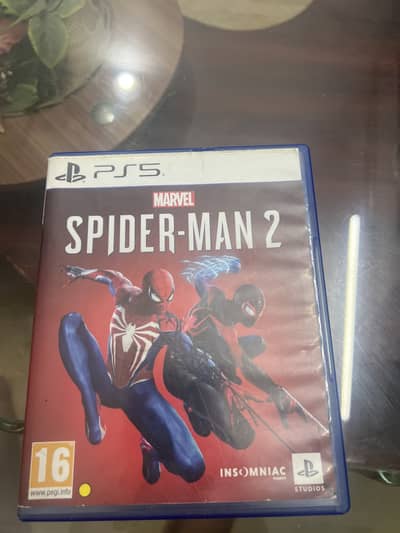 Spider man 2 disk for sale for ps5 only 2 weeks used just like new