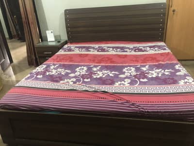 Bed with side table