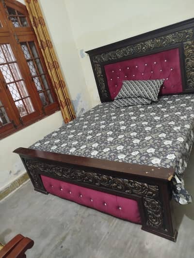 Double bed with side tables and dressing table