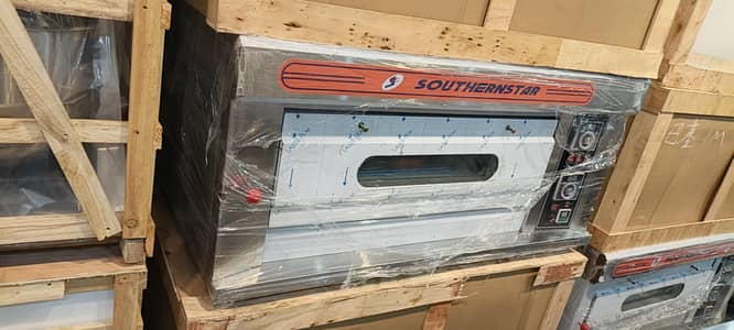 pizza oven, conveyor, deep fryer, dough mixer, food bags, prep table