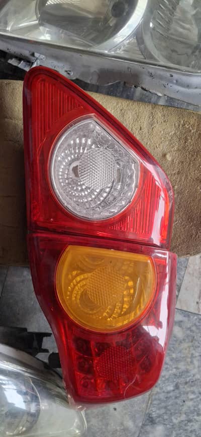 lights and bumpers of corolla gli 2009