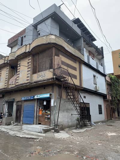 3 Marla House with 2 Commercials Shops Corner For Sale