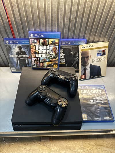 PS4 Slim With Two original controllers
