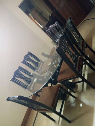 Glass top six persons Dining Table