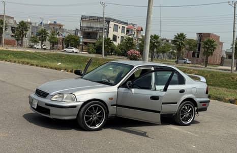 Honda Civic EXi 1997 better corrola xli. gli. cultus.