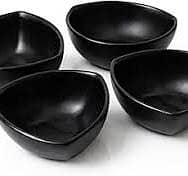 elegant 4-piece black dinnerware set.