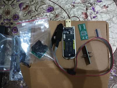 CH341A USB Programmer + SOP8 Test Clip + SOP8 to DIP8 Converter.