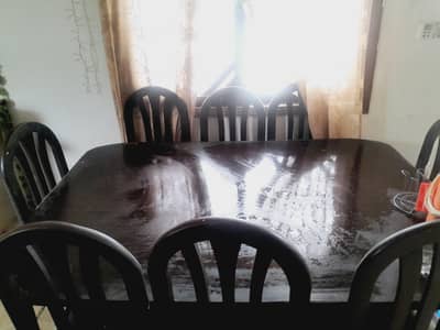Wooden dinning table with 8 chairs