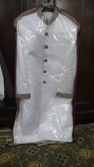 WHITE SHERWANI WITH KHUSSA  BRAND NEW NEVER USED