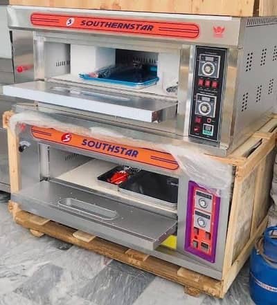 Pizza oven/ dough mixer/ counters/ deep fryer/ stoves/ brading table
