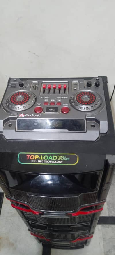 TopLoad panel speakers with NFC technology