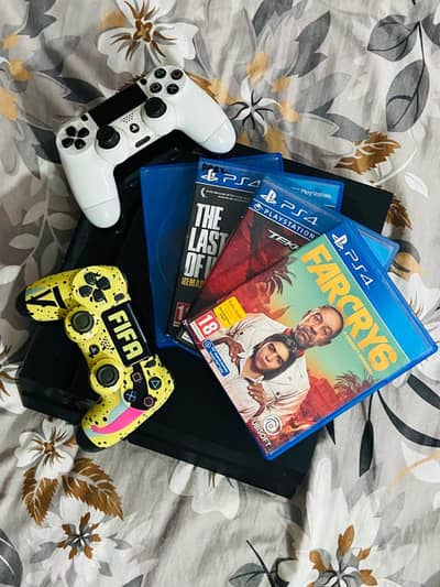 PS4 TOTALLY NEW CONDITION WITH FOUR GAME AND TWO CONTROLLER