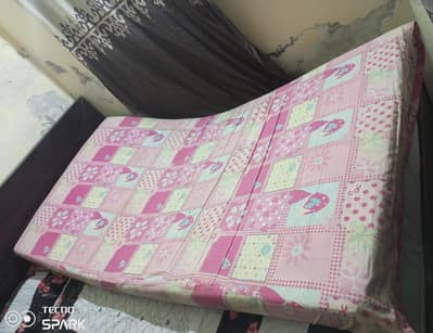 Two single bed mattresses in good condition are for sale