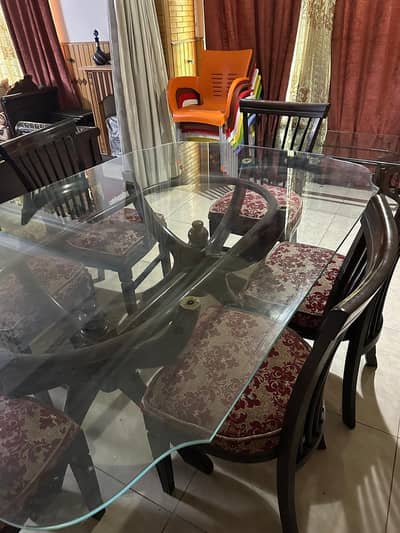I want to sell my dinning table with 6 chairs.