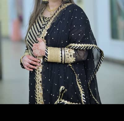 Long shirt with heavy sharara