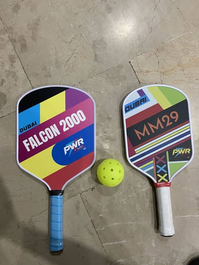 Pickleball Rackets and a ball