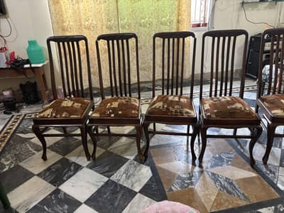 wooden dining table with Chairs.
