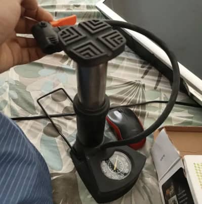 Mini foot air pump inflator is available for sale new condition