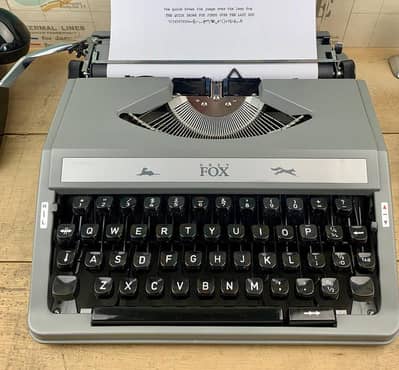 A beautiful 1980s Grey Fox Vintage Portable Typewriter 0300-4331882