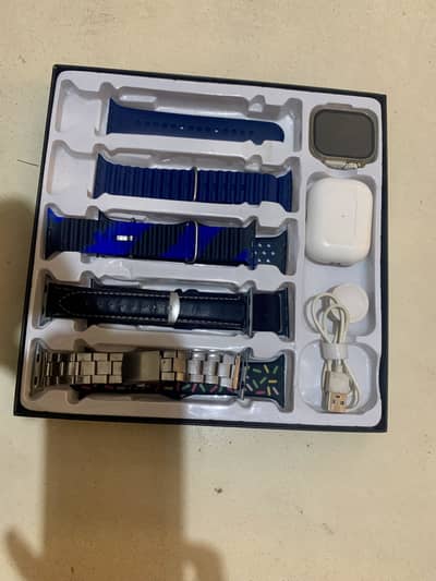 Smartwatch with earbuds and 7 straps negotiable price 10/7 condition